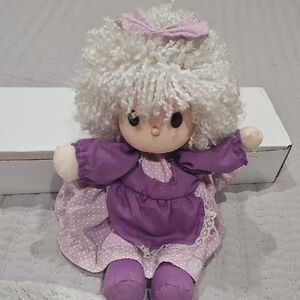 Purple and Pink Doll with Curly Hair